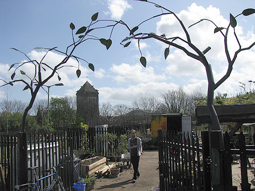 Looking back from the embankment, through the sculpture gate, towards the old church.