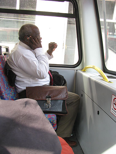 This Jamaican businessman was across from me at the top of a doubledecker bus, running his office from the front seat, while I was rolling northward for my lunch appointment.