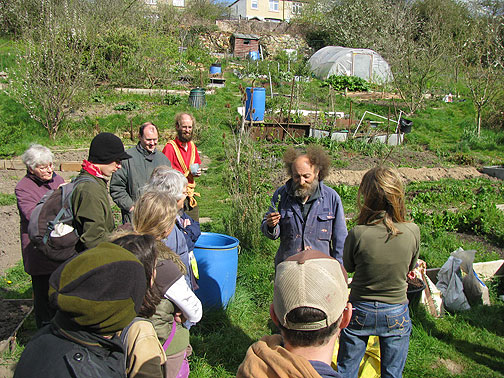 Mike Feingold demonstrating some edible plants...