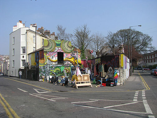 Across from the back of the proposed cultural center, an anarchist squat slated to be demolished in favor of a supermarket!