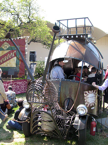 I'm one of the people behind the snail, and it is safe to say that we are ambivalent about Burning Man, so I'm not sure if I would say that the snail is inspired by Burning Man. Members of our little group have been doing metal work for years, for example as part of Survival Research Laboratories. We call ourselves "Oil Punk", which is much more about hands-on, dirt under the fingernails, than Steam Punk. Oil might be a dirty word, but we are more about DIY and such.