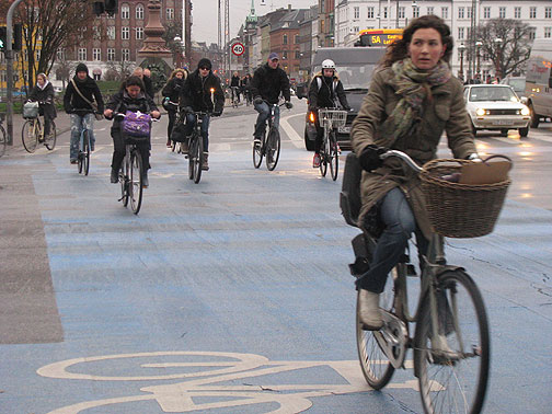 A typical scene of cyclists crossing the Norrebro Bridge in Copenhagen.