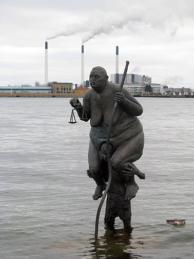 Jens Galschiot put Justitia in the water a few meters from Copenhagen's famous Little Mermaid statue. "I'm sitting on the back of a man--he is sinking under the burden--I will do everything to help him--except to step down from his back." Justitia, Western Goddess of Justice... see more of his amazing work at www.sevenmeters.net.