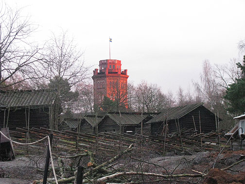 Setting sun on tower in Skansen, an open-air museum of historic Swedish buildings.