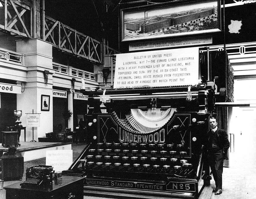 Before computers... but it's the keyboard we still have! ... 21-foot wide 14-ton Underwood Typewriter striking a 9-foot wide sheet of paper. 