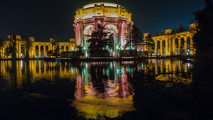 The Palace of Fine Arts lit up on the opening night of the centennial to match the lighting scheme that left such an impression a century ago.