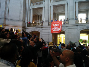 This "stop the evictions" banner was seized by police within minutes of its unfurling, as were the other banners dropped around "our" City Hall... go figure!