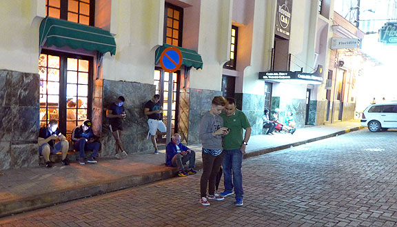 Getting a signal outside of Hemingway's storied Floridita Bar in Havana...