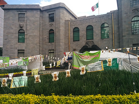 A whole 'nother protest at the Ministry of Health where there are hundreds of poopy diapers hung around the building!